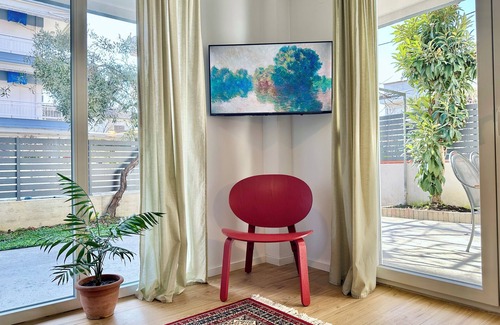 Olymbiaki Akti Apartment | Modern Seaside Home with Private Patio + Parking - Blue Zone Homes