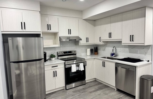 Southeast Calgary House | Modern Secondary Suite in Seton.(Private Entrance)