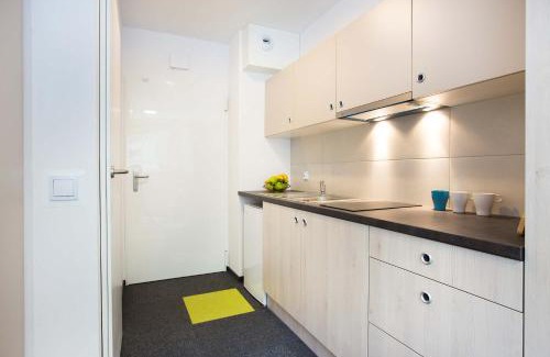 Fabryczna Apartment | Modern Studios in Wrocław with Desk for Remote Work and Access to the Gym by Noclegi Renters