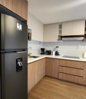 Cuenca Apartment | Modern suite with pool facing the park