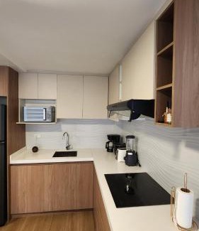 Cuenca Apartment | Modern suite with pool facing the park