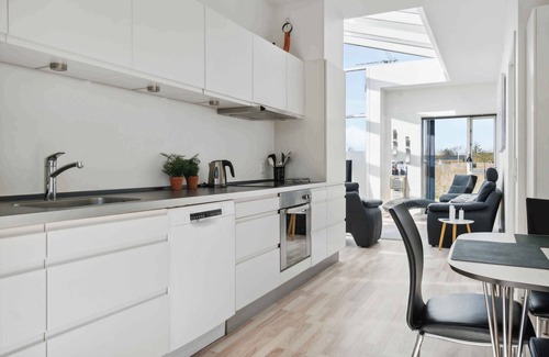 Frolunde House | Modern summer house with fantastic skylight.