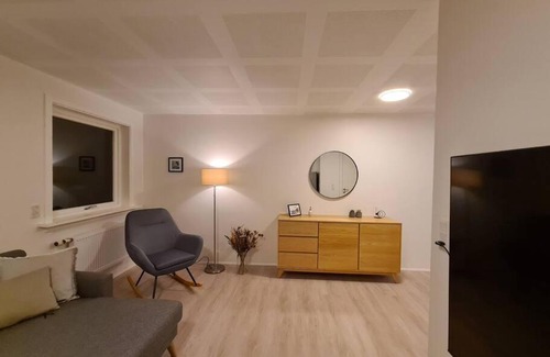 Torshavn Apartment | Modern unit with a king-size bed and a bathtub