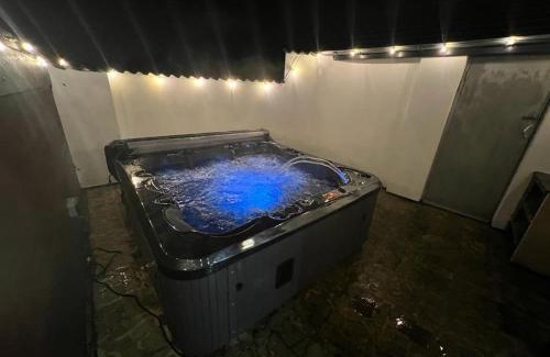 Roughton House | Modern upside down property with hot tub