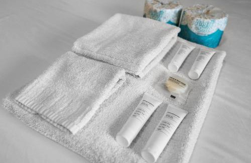 Naples House | Modern waterfront home in Artesia with pool/gym