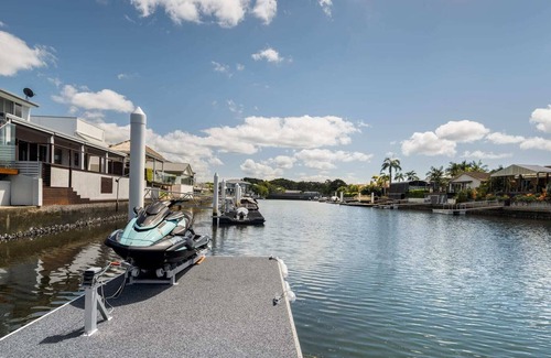 Runaway Bay House | Modern Waterfront Retreat| Private Pool & Dock