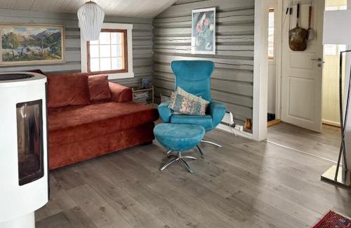 Vestre Slidre House | Modernized Log Cabin With Views Of The Mountains