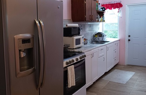 Sandy Point Town House | Mountain and Sea View Stay