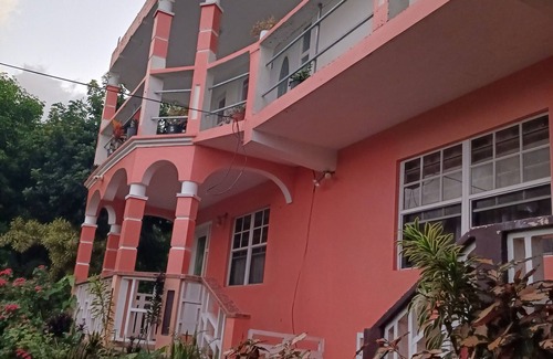 Sandy Point Town House | Mountain and Sea View Stay