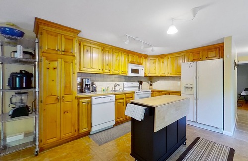 Warrensburg House | Mountain-view house with wood-burning fireplace, deck, patio, & washer/dryer