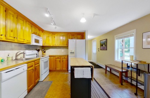 Warrensburg House | Mountain-view house with wood-burning fireplace, deck, patio, & washer/dryer