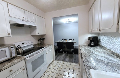 Southeast Colorado Springs Condo | Mountain Views! 2 bdrm, full home, 10th floor- 48ft balcony Pike's Peak sunsets!