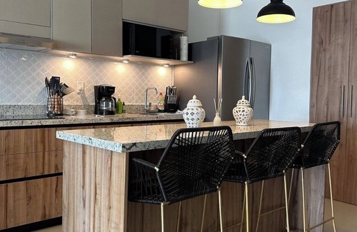 Mazatlan Condo | New modern 2 bed 2 bath condo steps away from the beach with rooftop pool deck!
