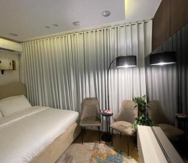 Al Olaya District Apartment | Najd Studio Al Aqeeq District Recliner Chair IPTV for free