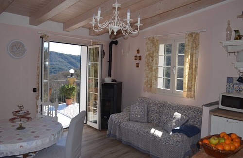 Costiolo House | Natural stone house in panoramic position with sunny terrace and garden