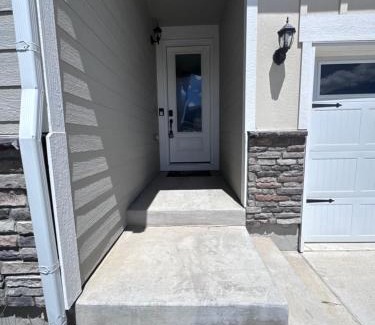 Commerce City House | Near Airport, 3BR, Stock Tank Pool, Mini-Golf, Game Rm