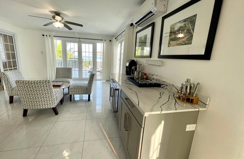 Orange Bay Villa | Negril Ocean Front, Beach, Pool Free Wifi, A/C, Outdoor Kitchen,Dining,Hot Tub.