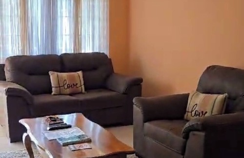 Negril Apartment | Nellody's spacious n serene 2-bedroom apartment with AC, WiFi in tranquil Negril