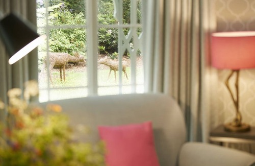 Weston Under Lizard Cottage | Nestled in the depths of Temple Wood, Pink Cottage is a unique, romantic retreat sleeping two guests