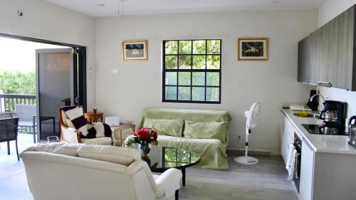 Fitts Village Apartment | Nestled in the heart of Fitts Village, Zinnia becons with the promise of a costa