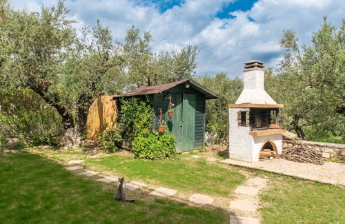 Alonia Apartment | Nestled on the ground floor with direct garden access amidst olive trees