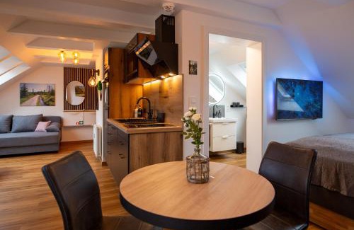Bad Harzburg Apartment | NEU! 9,8 Außergewöhnlich Bergblick mit Balkon Boxspringbett Kaffeevollautomat inkl Bettwäsche Handtücher #MeeneFewo de