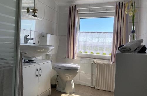 Osteel Apartment | NEU! FeWo am alten Deich mit Balkon