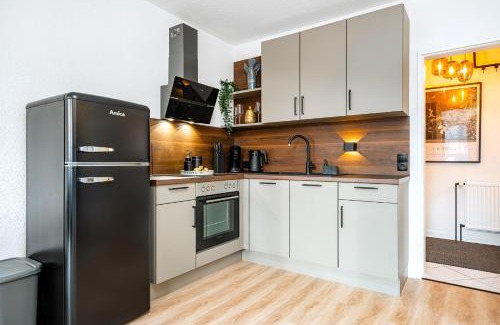 Emden Apartment | NEU! Modernes Apartment am Larrelter Tief - Balkon, Privatparkplatz & FIRE TV!