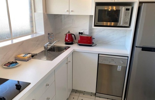 Neutral Bay Apartment | Neutral Bay- WY603 Wyagdon Street - Modern Studio with Harbour Views, Pool Parking in Secure Building