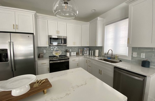Fenwick Island House | New 5 bedroom & 6 bathroom waterfront home on canal with pool close to beach!