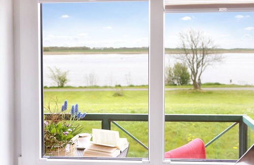 Toenning Apartment | New 5-star vacation apartment with a fantastic view of the Eider.