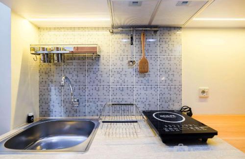 Pondokcina Apartment | New and Nice Studio at Evenciio Margonda Apartment By Travelio