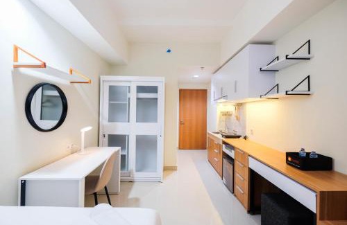 Pondokcina Apartment | New and Nice Studio at Evenciio Margonda Apartment By Travelio