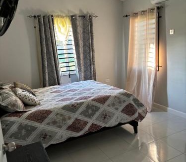 Old Harbour Bed & Breakfast | New Cozy Entire home 2 Bedroom- AC, Wifi, 24 hour Security, Smart Tv