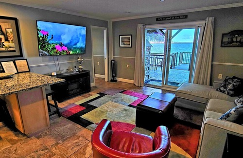 Malta Condo | New-First floor lakefront, 160 ft dock, 2 minutes to Browns Beach & Restaurants!