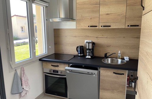 Rue House | New home in quiet hamlet close to beaches.