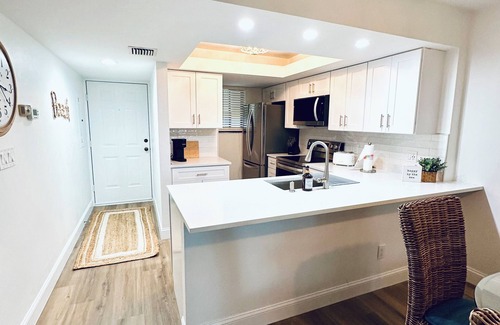Bonita Bay Condo | New! Just renovated coastal condo, Gated community, 10 min to beach by shuttle!