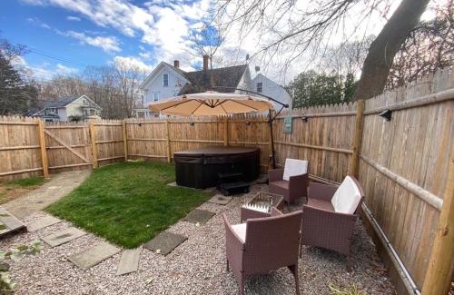 Laconia Apartment | NEW! Lovely unit w/PRIVATE Hot Tub and patio!