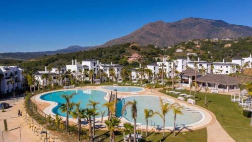 Estepona Apartment | New luxury apartment in family resort w pools wifi