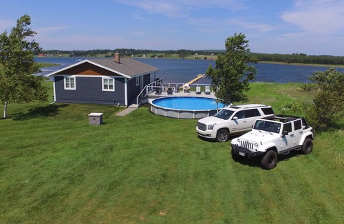 Clinton Cottage | New Pictures & MORE UPGRADES!!!! True Waterfront Paradise in Prime location!