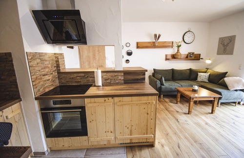 Bischofsheim an der Rhon Apartment | New, romantic Rotmilan holiday apartment with a view of the mountains