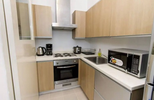 Bonifacio Global City Condo | New! Stylish 2 BR in BGC - Fast Wi-fi 58" UHD TV