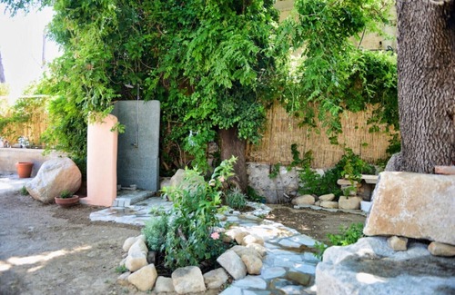 Ikaria Apartment | New,uniquely cozy place,waterfront garden,actual steps to crystal clear beach -