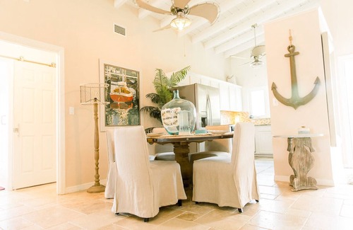 Royal Harbor Condo | New! Waterfront, 1/2 block to Naples Bay, Bike! Private Doc! Pet Friendly!