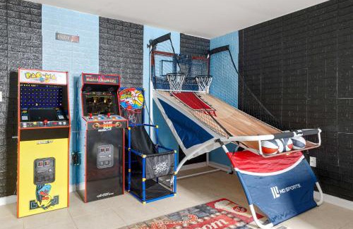 Newark House | Newark Gem Ruby 3BR, 3BA - Sleeps 14 - Walk to Prudential Center and Newark Penn Station, Near EWR and American Dream Mall, includes Parking - WiFi - Laundry - Backyard - Gym