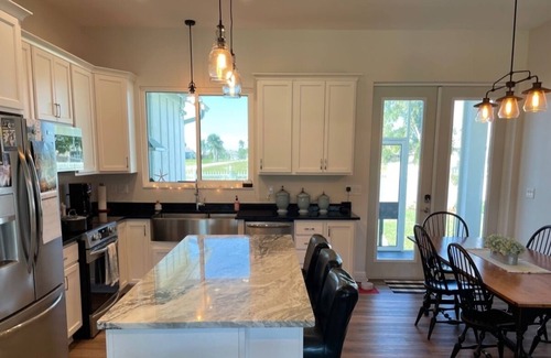 Mariner Other | Newly built Farmhouse style home located in Cape Coral. Close to Beaches.