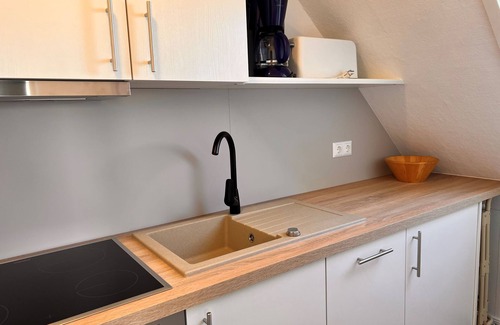 Steenodde Apartment | Newly furnished vacation apartment in direct tidal flat location with balcony and sea view.