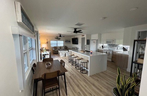 Port Pine Heights House | NEWLY RENOVATED 3/2 WITH POOL AND CANAL ACCESS!
