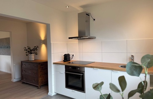 Haan House | Newly renovated semi-detached house with garage and garden