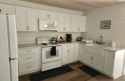 Sullivan House | Newly renovated waterfront cottage with spectacular sunset views